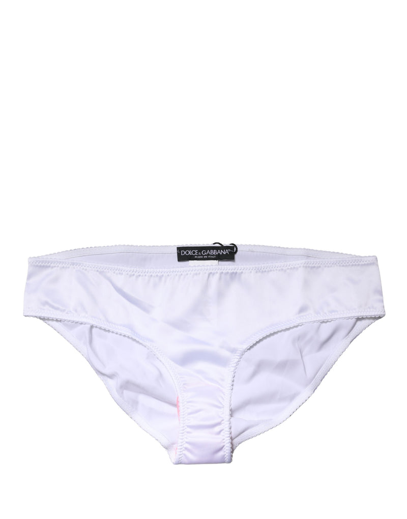 White silk stretch mid-waist brief panty with scalloped trim and a Dolce & Gabbana tag on the waistband