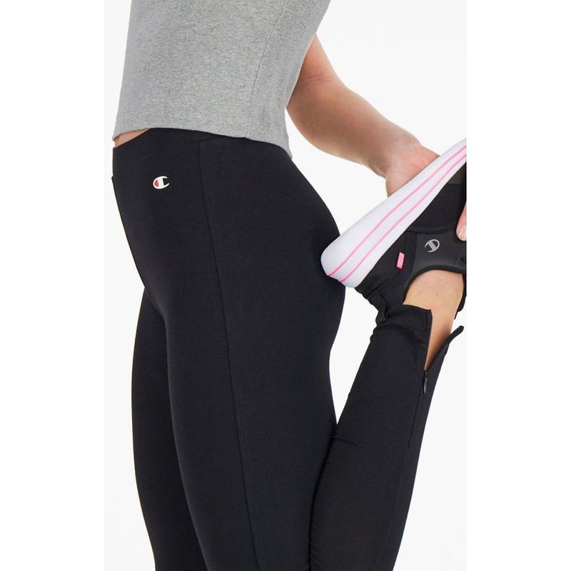 Champion black cotton fitted leggings worn during a stretch