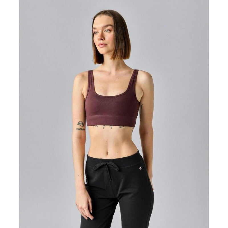 Brown ribbed cotton scoop neck sports bra worn by a model