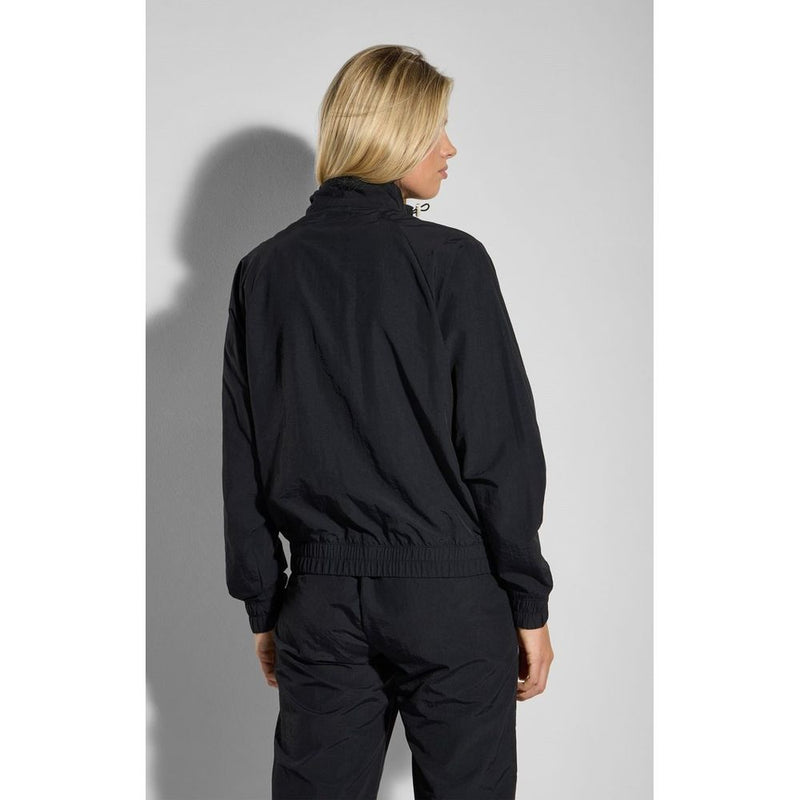 Black polyamide sweatshirt with high collar worn from the back