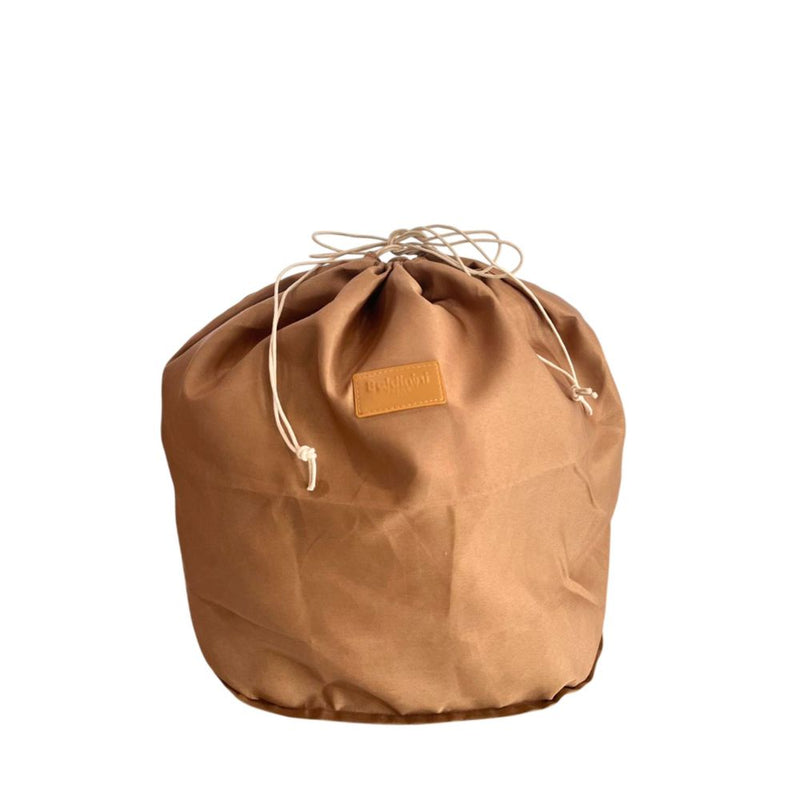 Brown PU leather drawstring dust bag with a tan brand patch