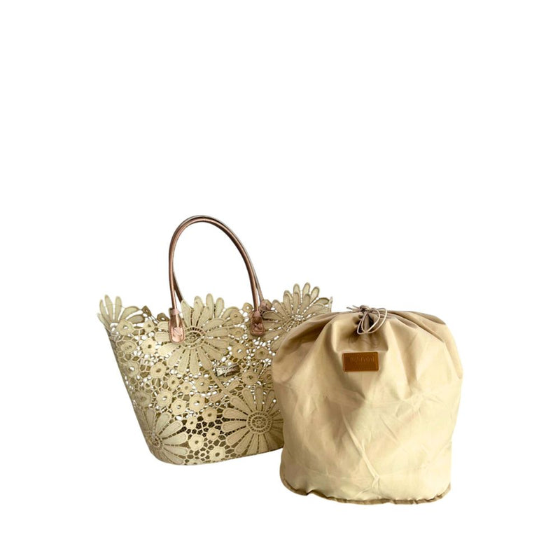 Beige PU floral cut-out tote handbag with twin handles and a matching drawstring inner pouch