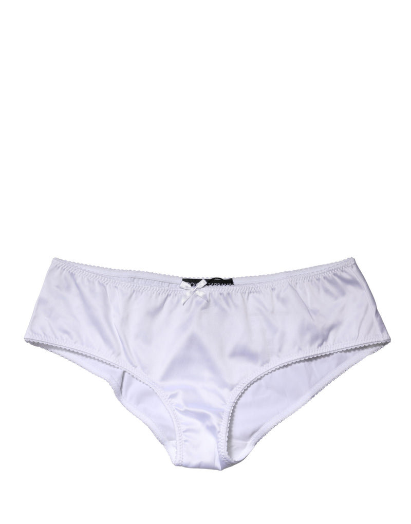 White silk stretch mid-waist brief panty with a small front bow