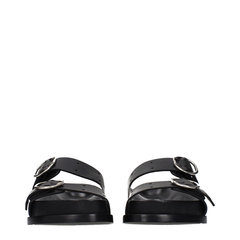 Pair of black leather slip-on sandals with double straps and silver buckles