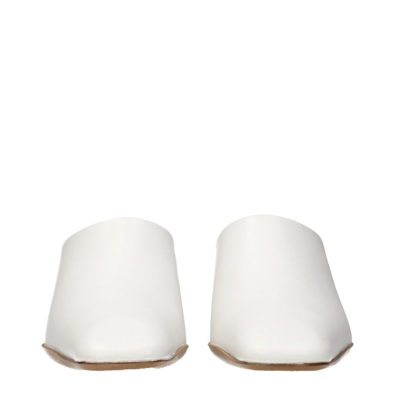 White leather slip-on shoes with square toes viewed from the front