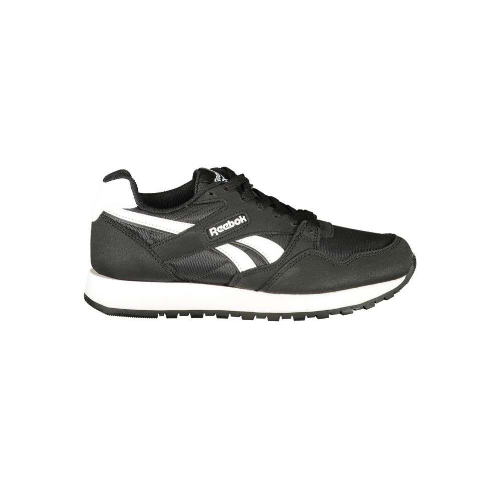 Women's black polyester Reebok sneaker with white logo detailing and a white midsole, in a classic low-top style.