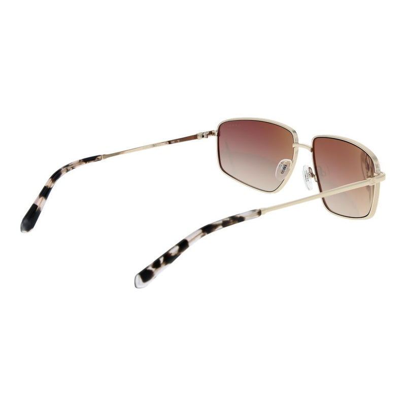 Gold metal sunglasses with brown gradient lenses and tortoiseshell temple tips