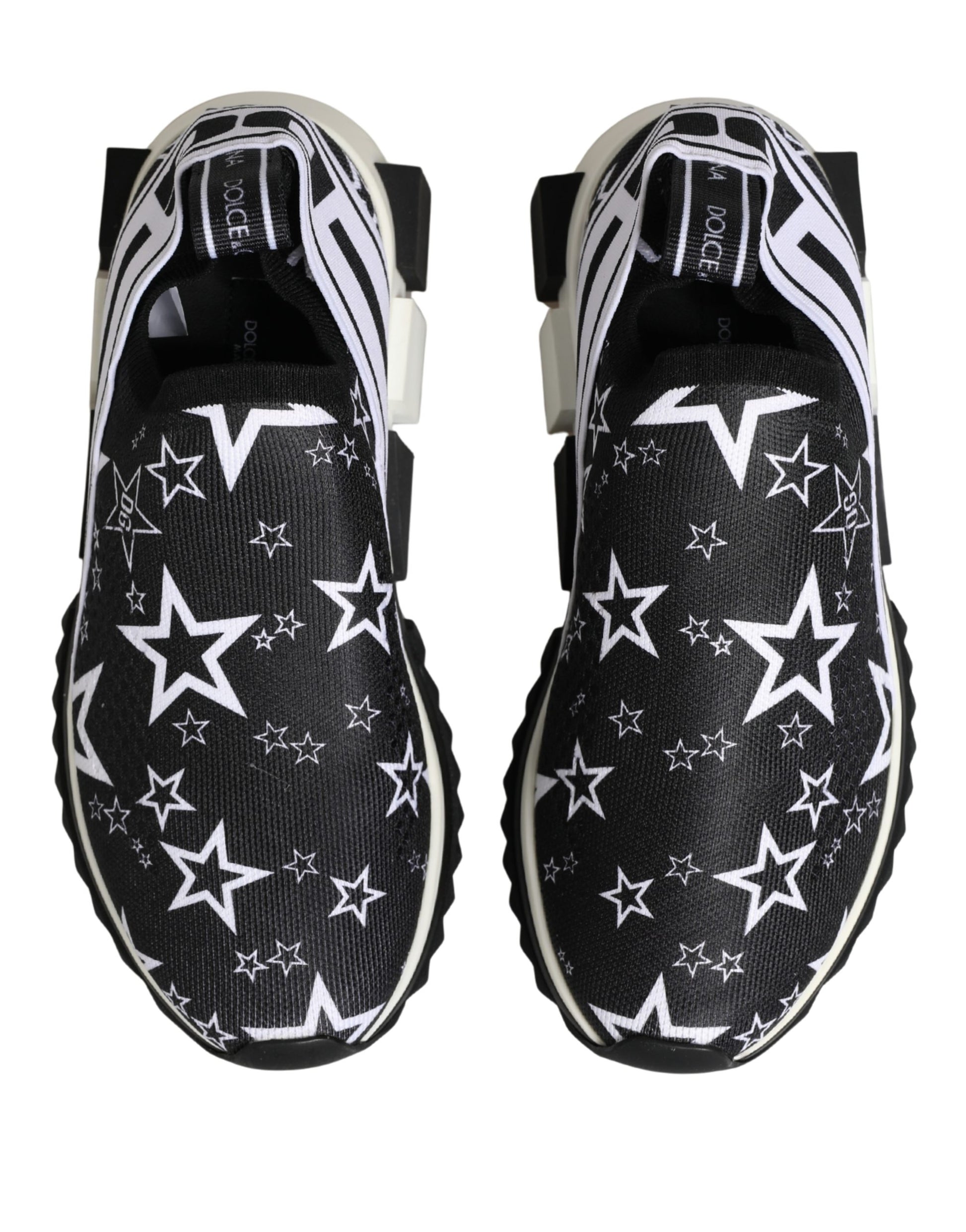 Dolce & Gabbana black and white stretch fabric Sorrento sneakers with a star pattern and slip-on style.