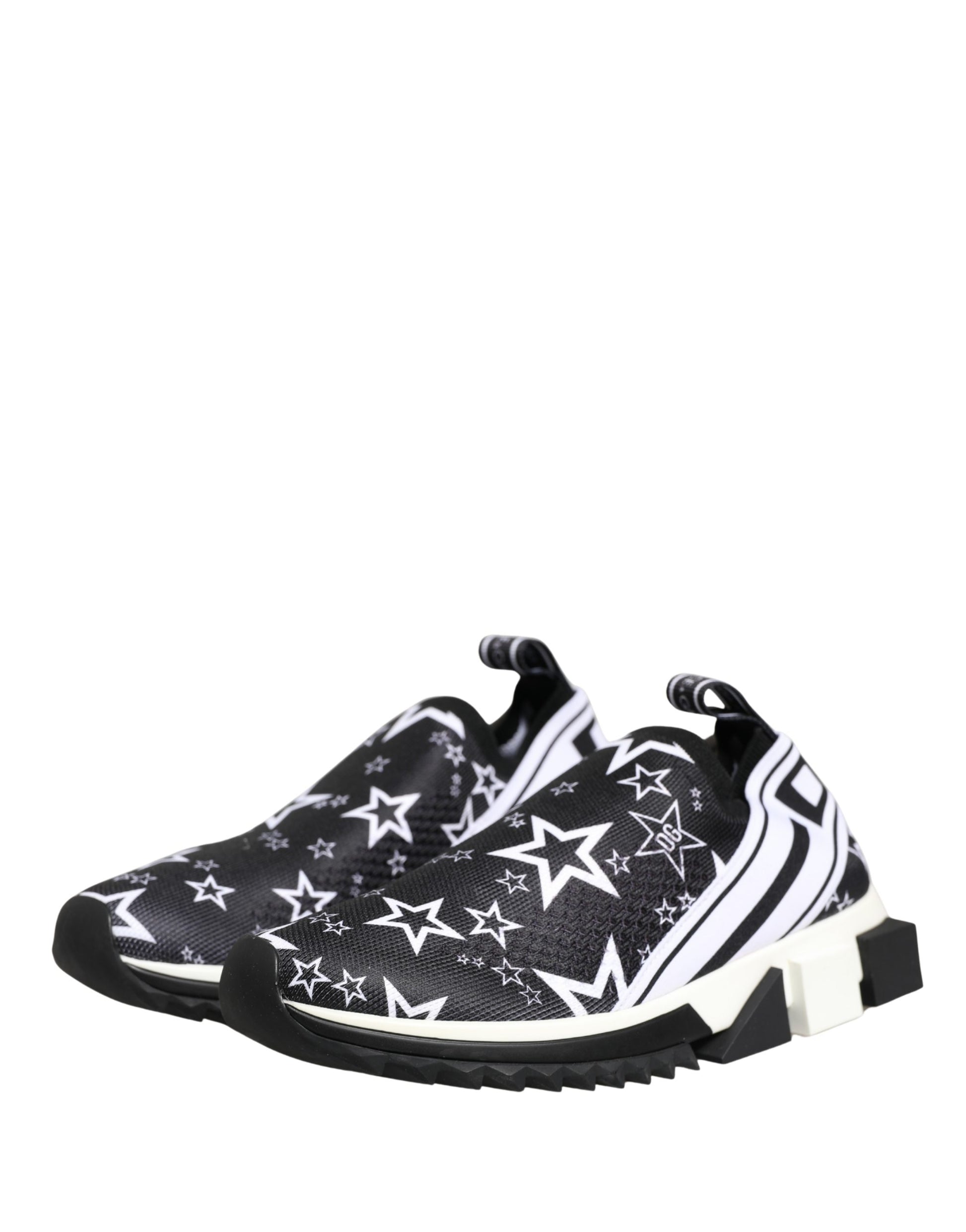 Black and white Dolce & Gabbana Sorrento slip-on sneakers in stretch knit with star print and logo detailing.