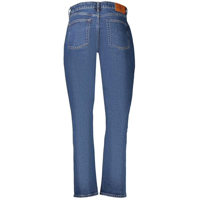 Blue cotton women's skinny jeans viewed from the back with a brown leather logo patch