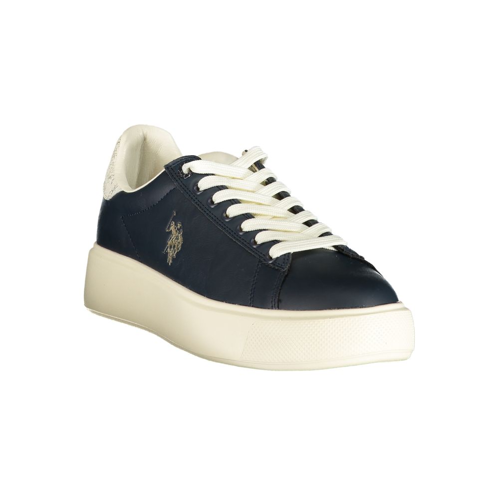 Navy blue polyurethane women’s sneaker with a chunky cream platform sole, white laces, and gold logo detail.