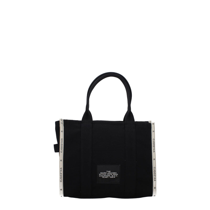 Black canvas tote bag with dual top handles and white side striping