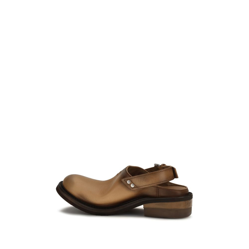 Miu Miu brown calf leather mule with a round toe, side stud detailing, and a low stacked heel.