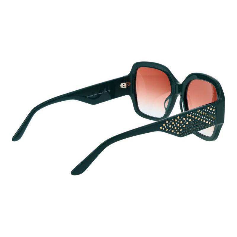 Dark turquoise acetate sunglasses with studded temples and gradient lenses