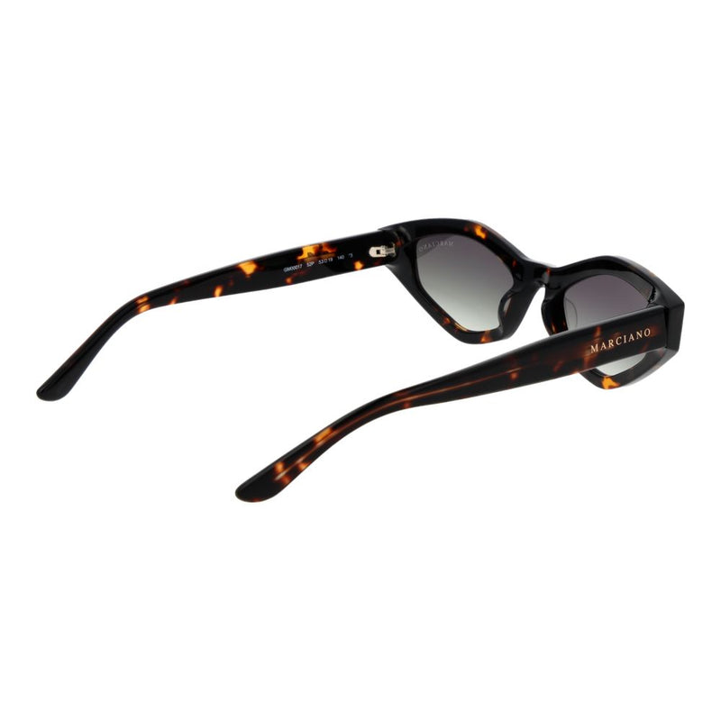 Brown tortoiseshell acetate cat eye sunglasses with gradient lenses