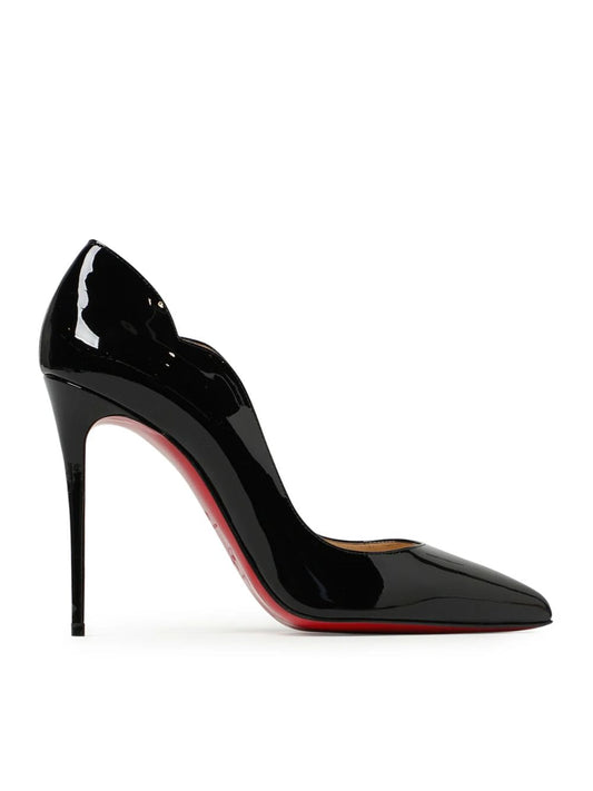 Black patent leather Christian Louboutin Hot Chick pumps with a scalloped topline, pointed toe, and red sole.