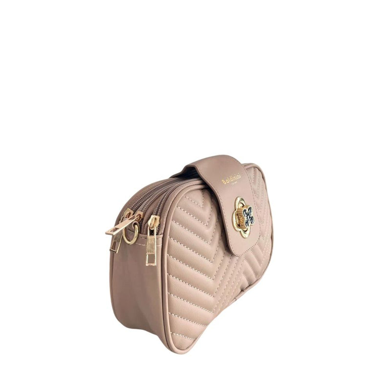 Beige quilted faux leather crossbody bag with dual zippers and a front flap closure
