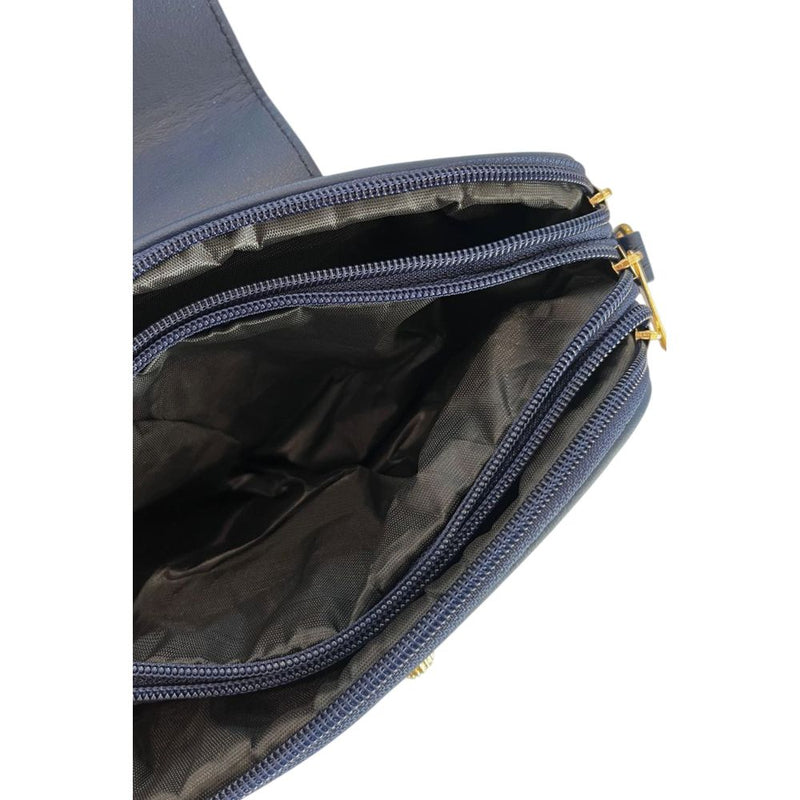 Open blue PU leather women's crossbody bag with multiple zippered compartments and dark lining