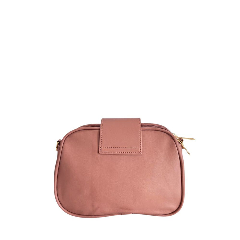 Pink PU leather women's crossbody bag with a flap closure