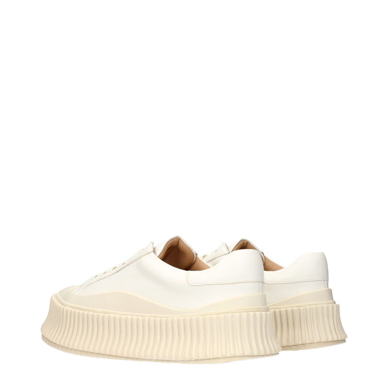 White leather platform sneakers with chunky ridged rubber soles