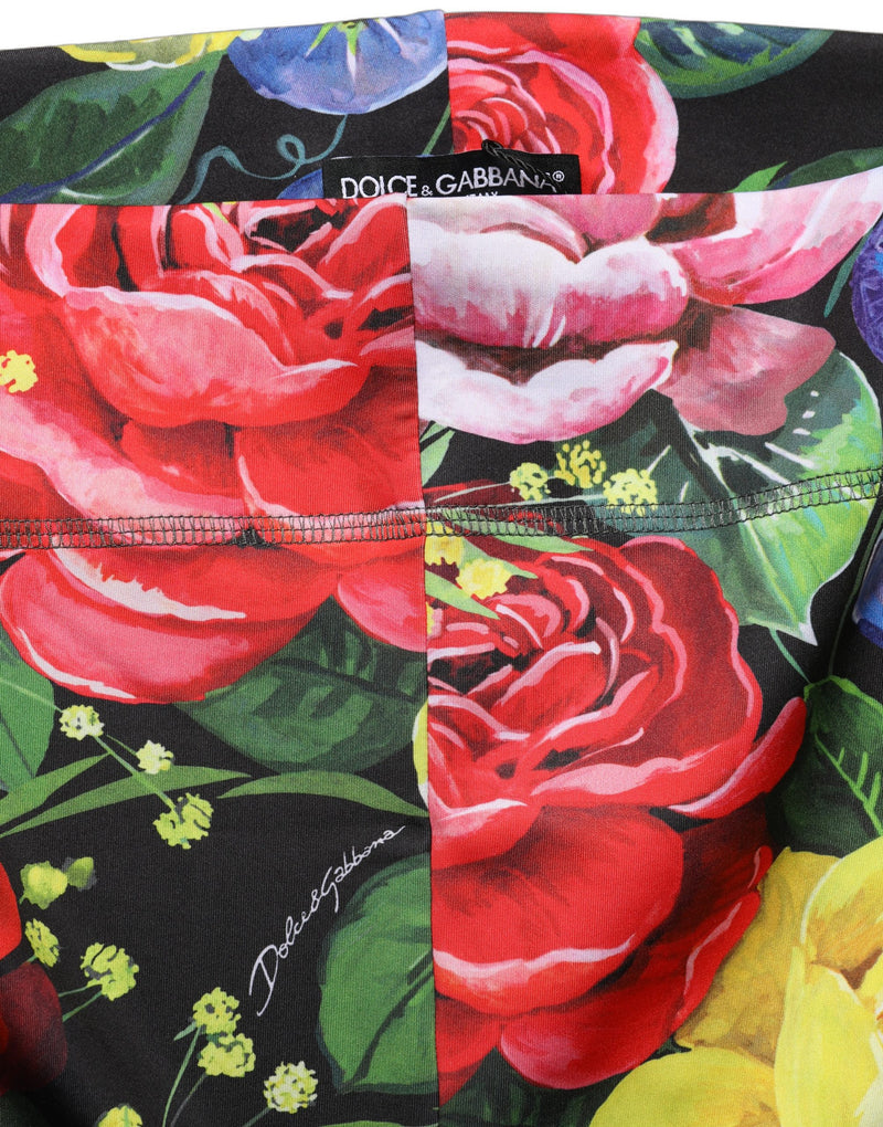 Multicolor floral stretch jersey leggings with bold red roses and green leaves on black