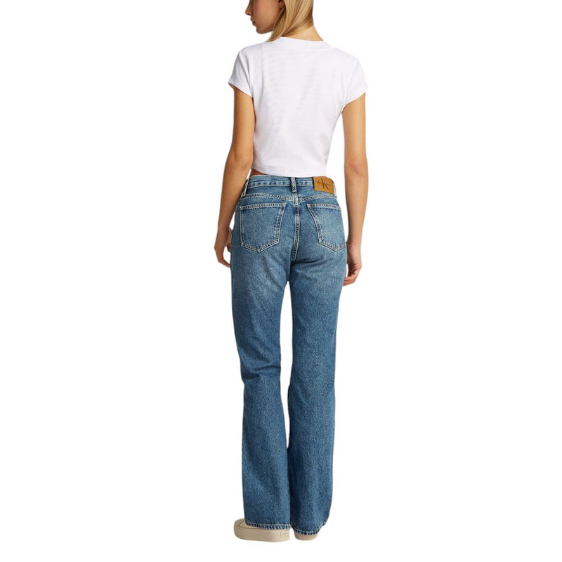 White cotton short-sleeve t-shirt worn with blue jeans
