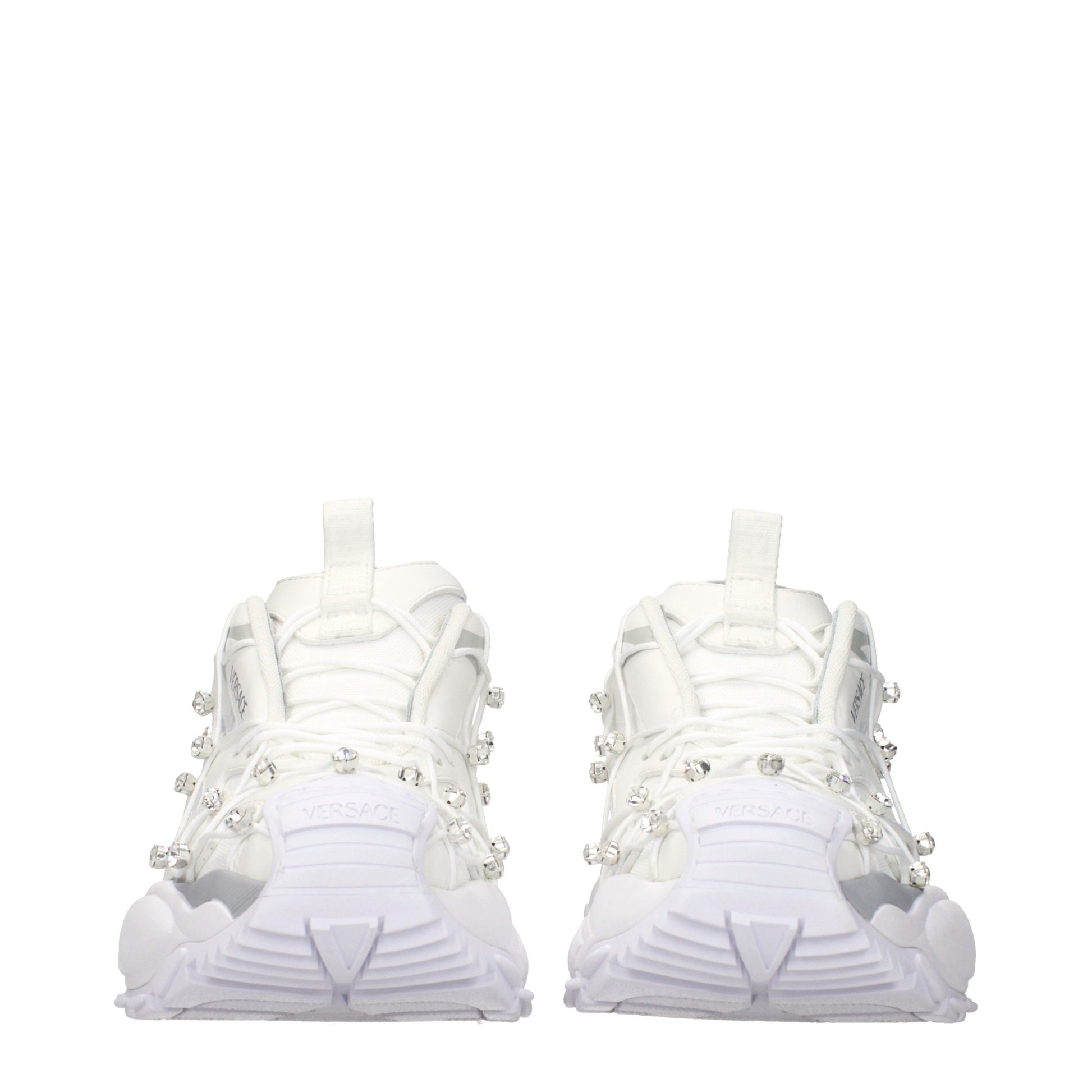 White Versace fabric sneakers with crystal embellishments and a thick, chunky rubber sole.
