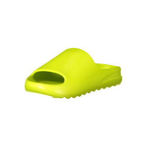 Bright yellow Norway 1963 women’s polyurethane slide sandal with a chunky, modern minimalist design.