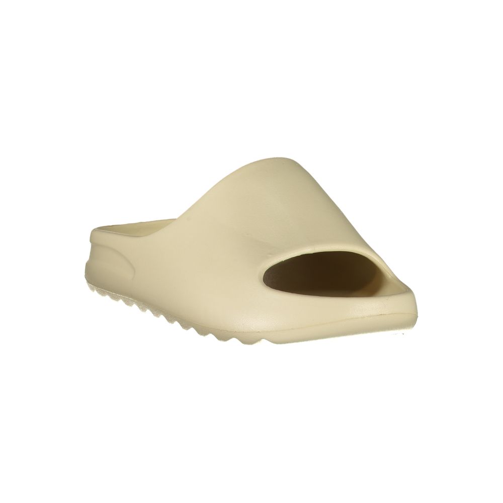 Beige polyurethane women's slide sandal with a minimalist design and textured sole.