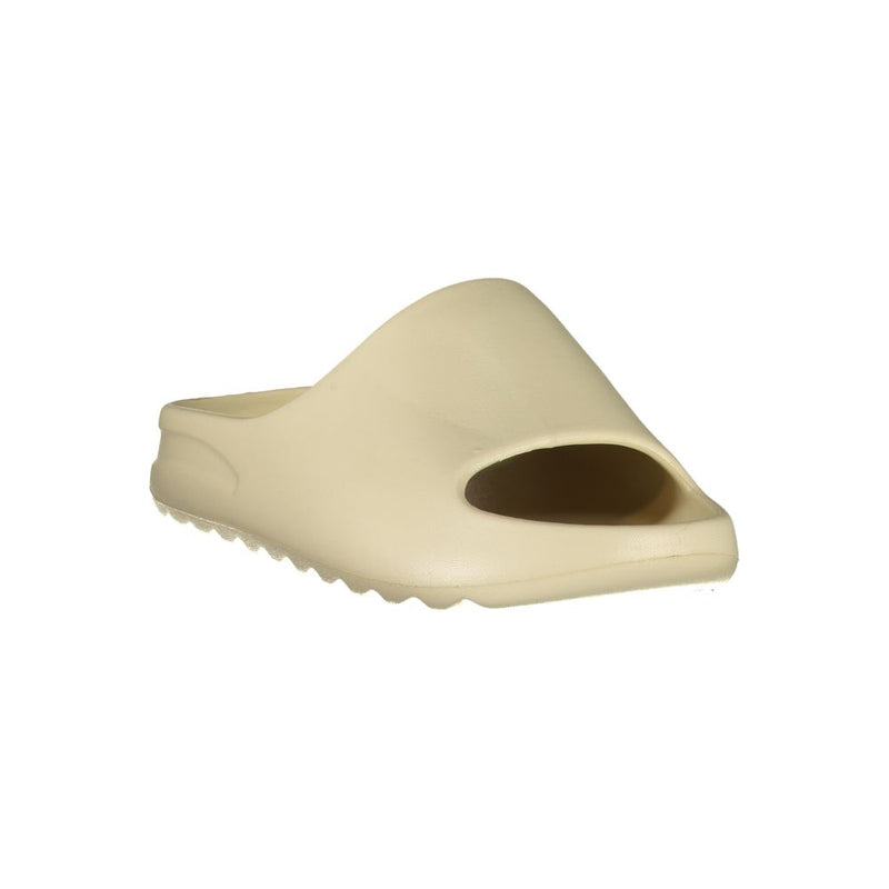Beige polyurethane women's slide sandal with a minimalist design and textured sole.