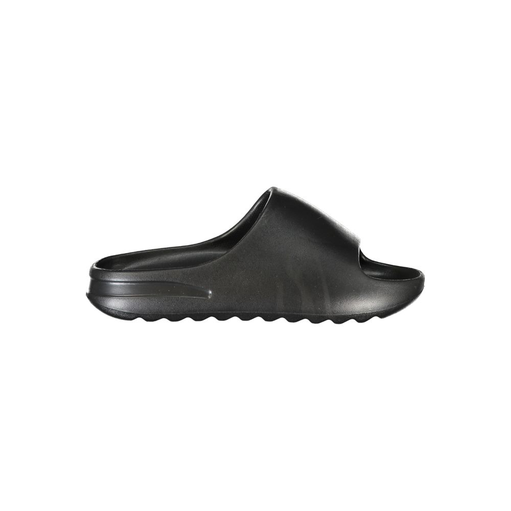 Black Norway 1963 women's slide sandal in polyurethane with a chunky, molded-sole slip-on style.
