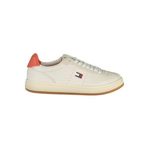 Tommy Hilfiger beige polyurethane women’s lace-up sneaker with red heel detail and side logo.