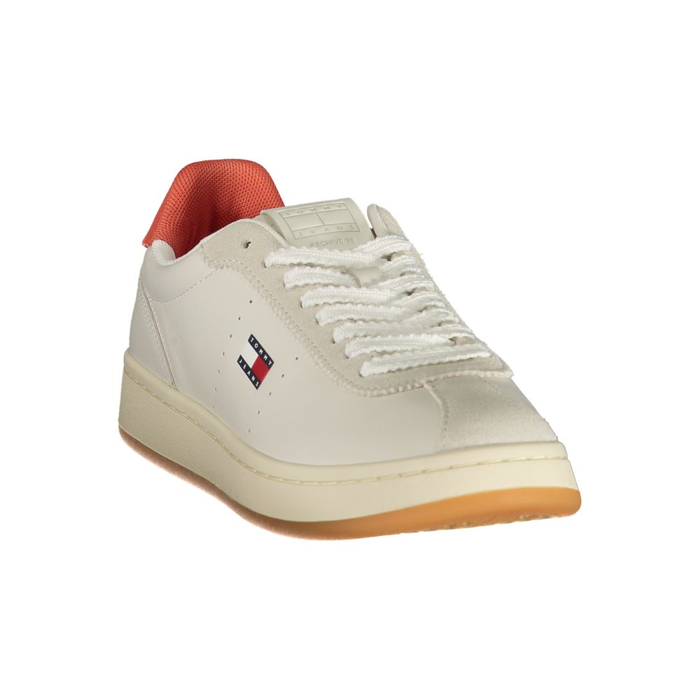 Tommy Hilfiger beige polyurethane women's sneaker with red heel tab and Tommy Jeans logo.