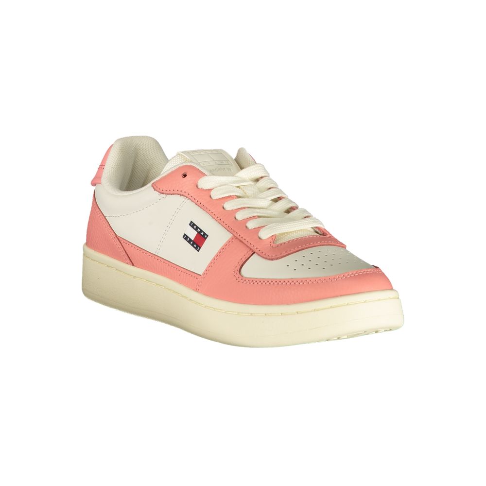 Tommy Hilfiger white and pink polyurethane women’s lace-up sneaker with logo detail and rubber sole.