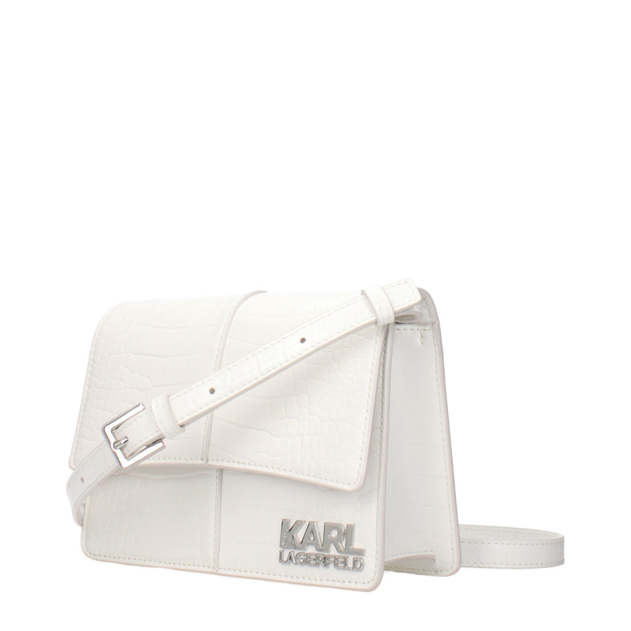 White crocodile-embossed polyethylene crossbody bag with a front flap and silver buckle strap