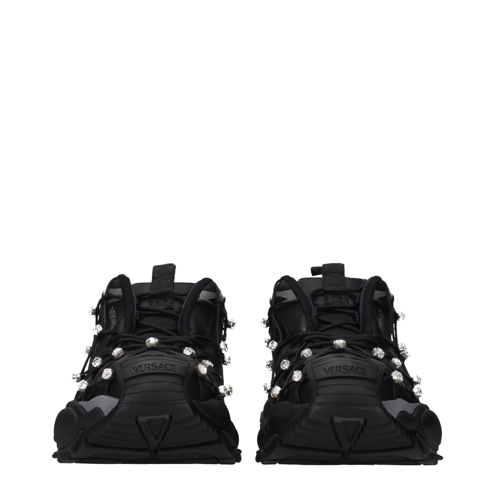 Versace black fabric chunky sneakers with crystalline embellishments and a thick, ridged rubber sole.