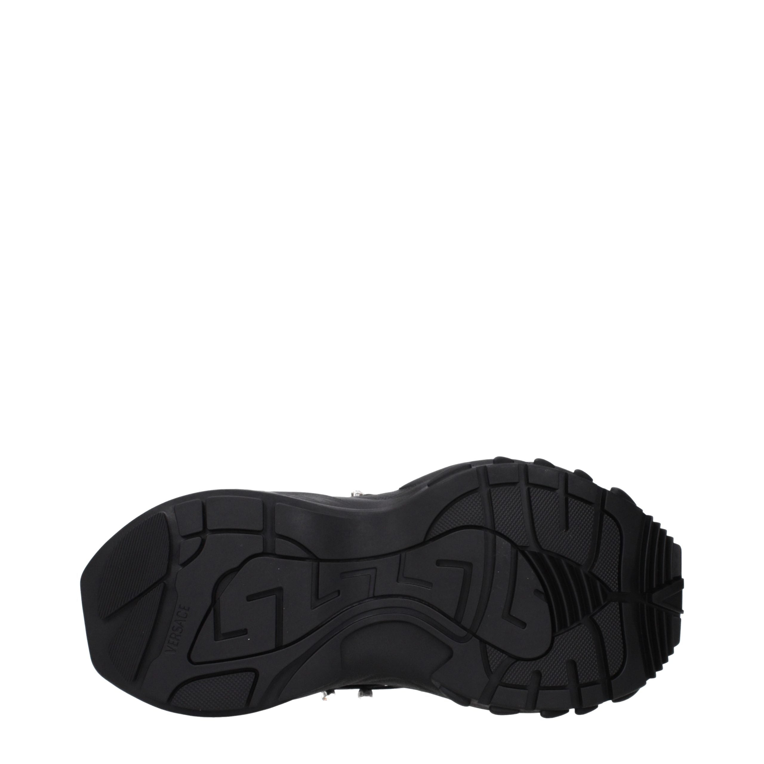 Black Versace chunky sneaker featuring a textured, grippy rubber sole with a signature Greca pattern imprint.