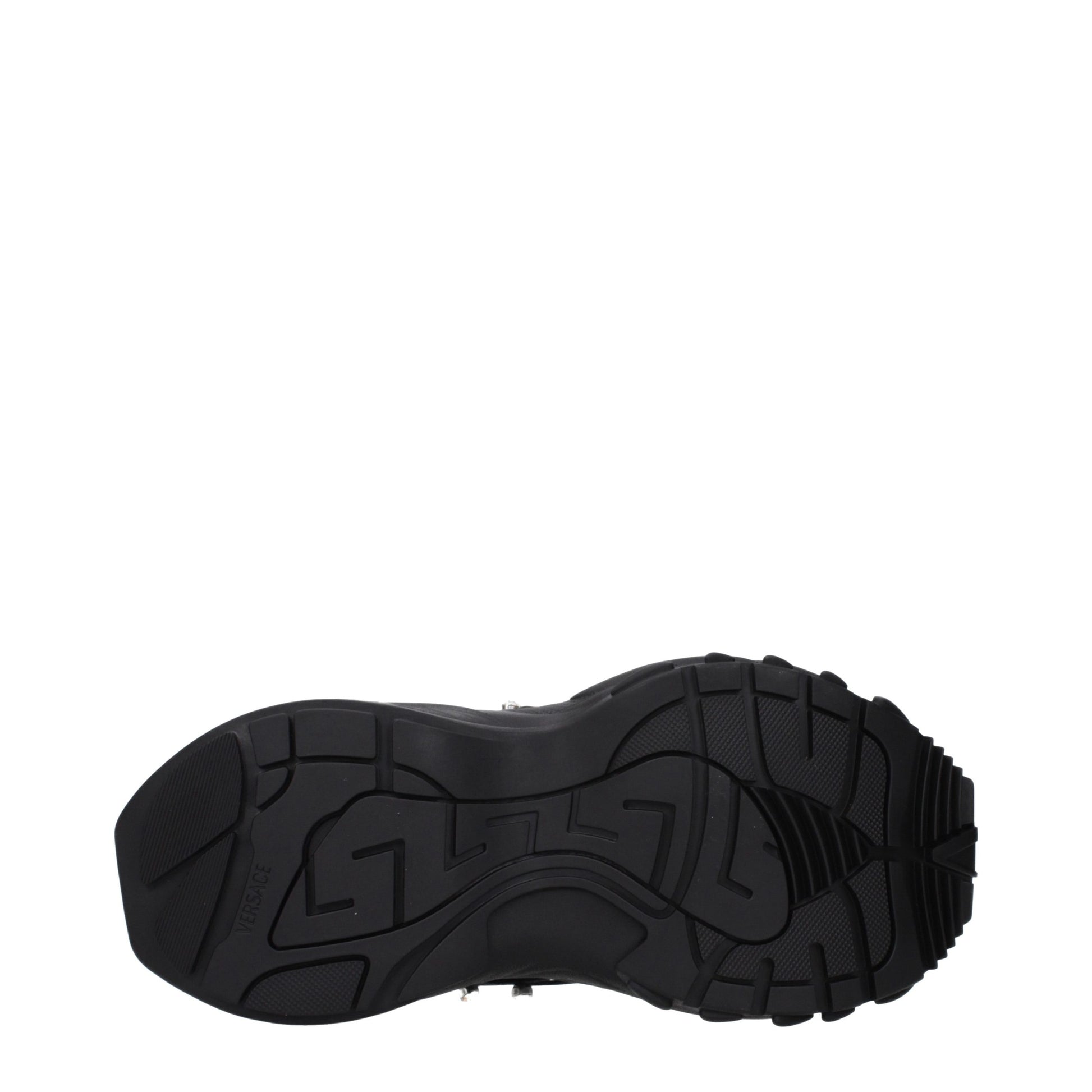 Black Versace chunky sneaker featuring a textured, grippy rubber sole with a signature Greca pattern imprint.