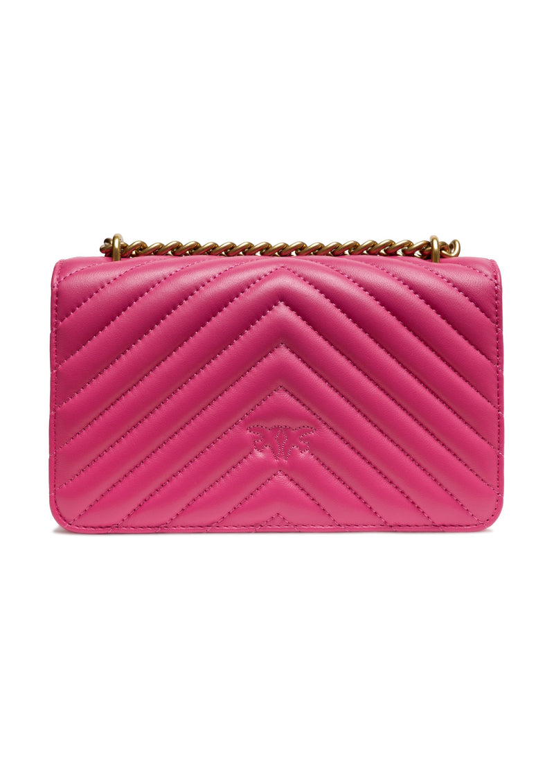 Pink quilted leather mini shoulder bag with gold chain strap and embossed birds logo