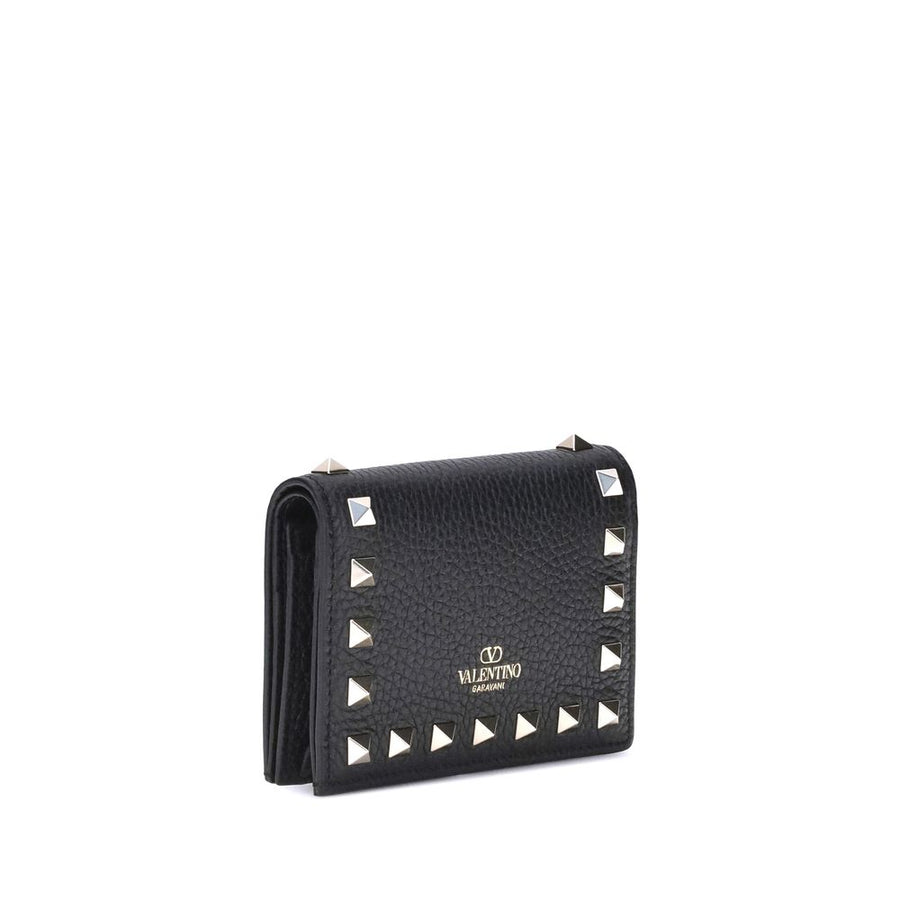 Black textured leather wallet with silver pyramid studs along the edges