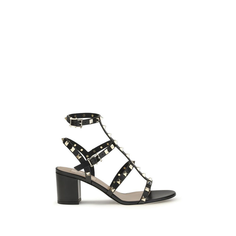 Black leather studded heeled sandal with ankle straps