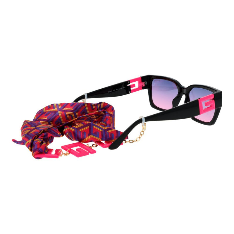 Guess black plastic sunglasses with pink temples and gradient lenses attached to a patterned scarf chain