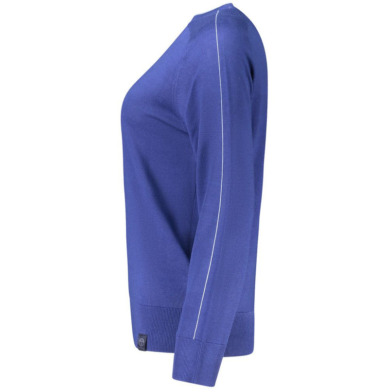 Side view of a blue knit viscose women's crewneck sweater with a contrasting white stripe down the sleeve