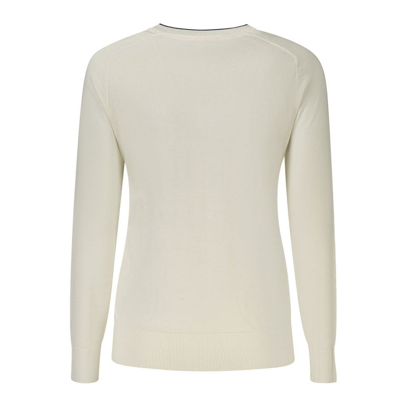 Rear view of a white viscose long-sleeve women's top with a ribbed hem and cuffs