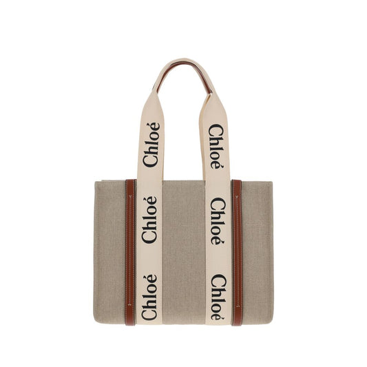 Chloé beige linen tote bag with brown leather trim and cream handles featuring black Chloé logos.