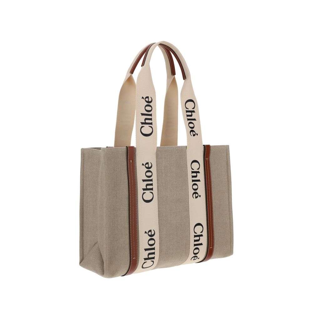 Chloé beige linen tote bag with cream branded straps and brown leather trim.