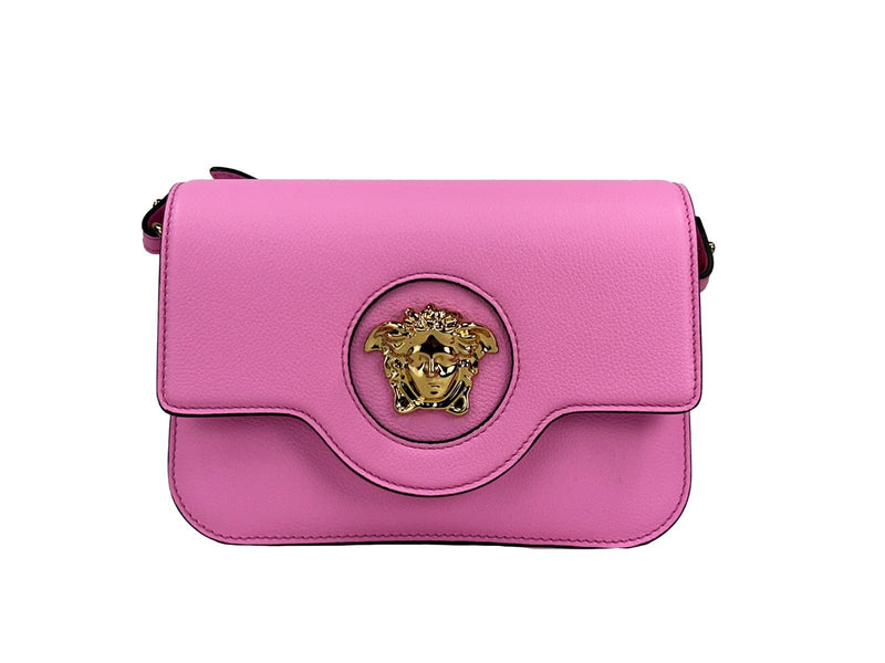 Bright pink leather Versace La Medusa shoulder crossbody bag with a prominent gold-tone Medusa head logo