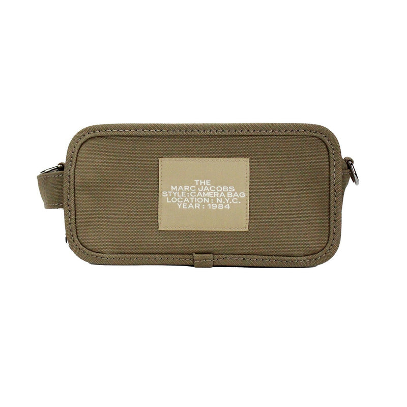 Slate green canvas Marc Jacobs camera bag with a centered branding patch