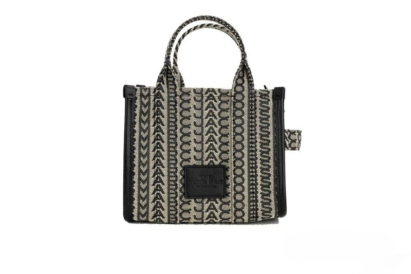 Beige and black woven jacquard canvas mini tote handbag with monogram pattern and dual top handles