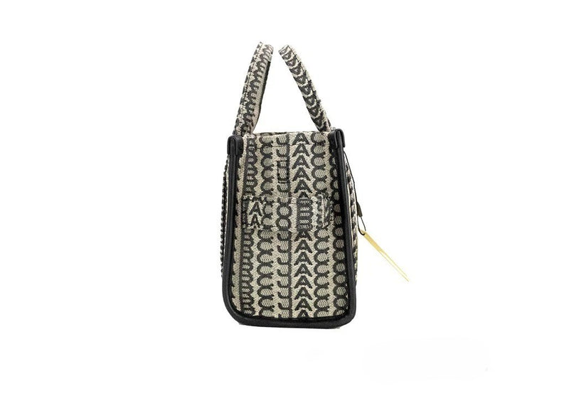 Beige and black woven jacquard canvas mini tote bag with monogram pattern